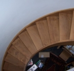 Curved wooden stair case